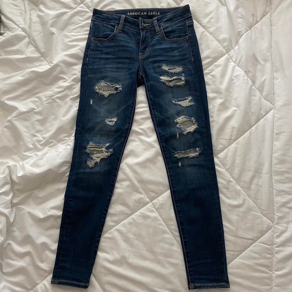 dark washed ripped skinny jeans